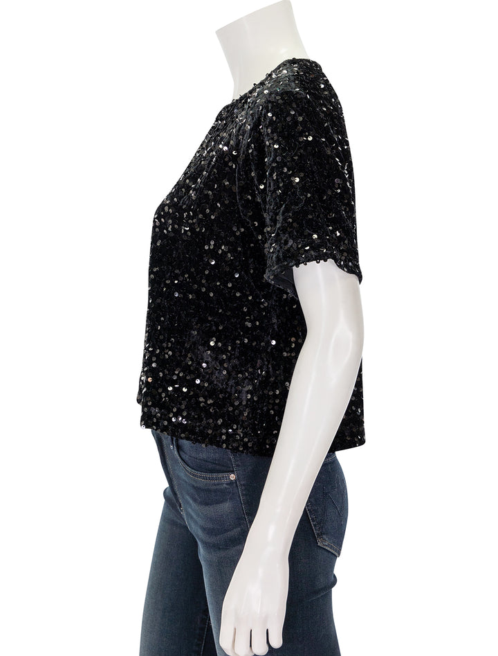 Side view of Steve Madden's cressa top in black.