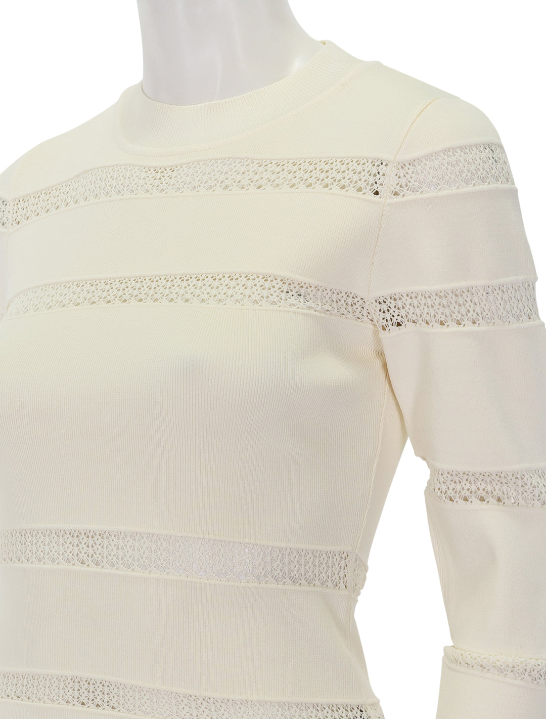 Close-up view of Sea NY's devon knit long sleeve top in cream.