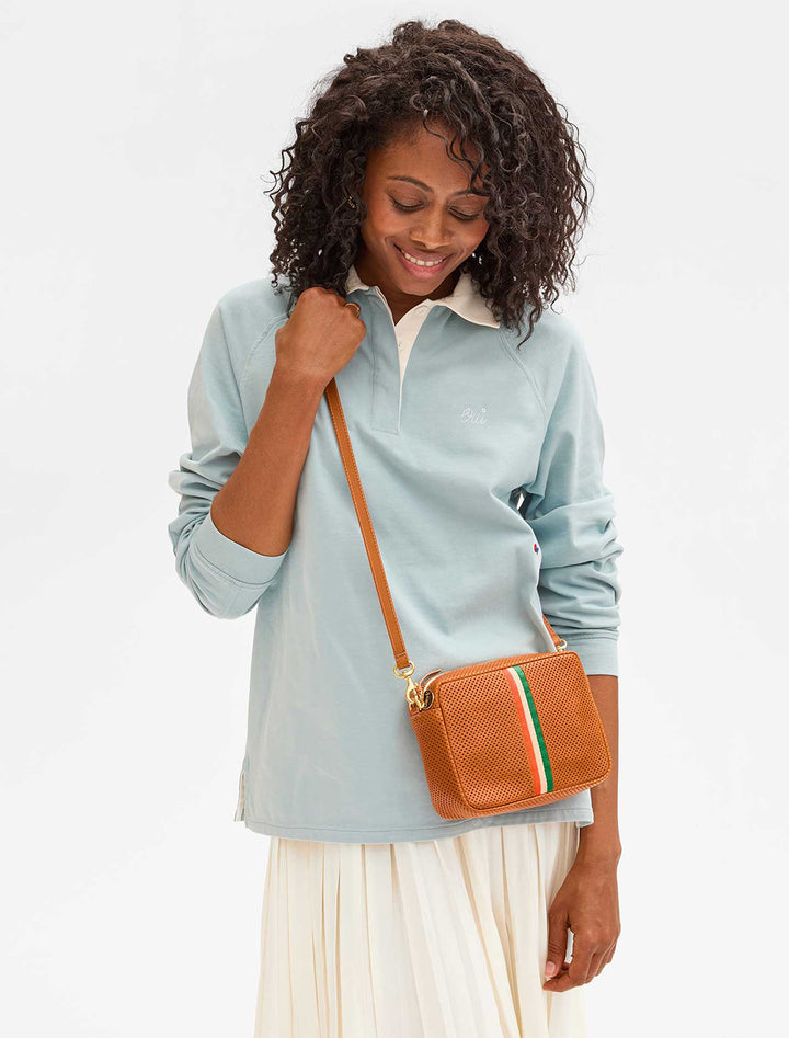 model wearing midi sac in cuoio perf with poppy, blush and emerald