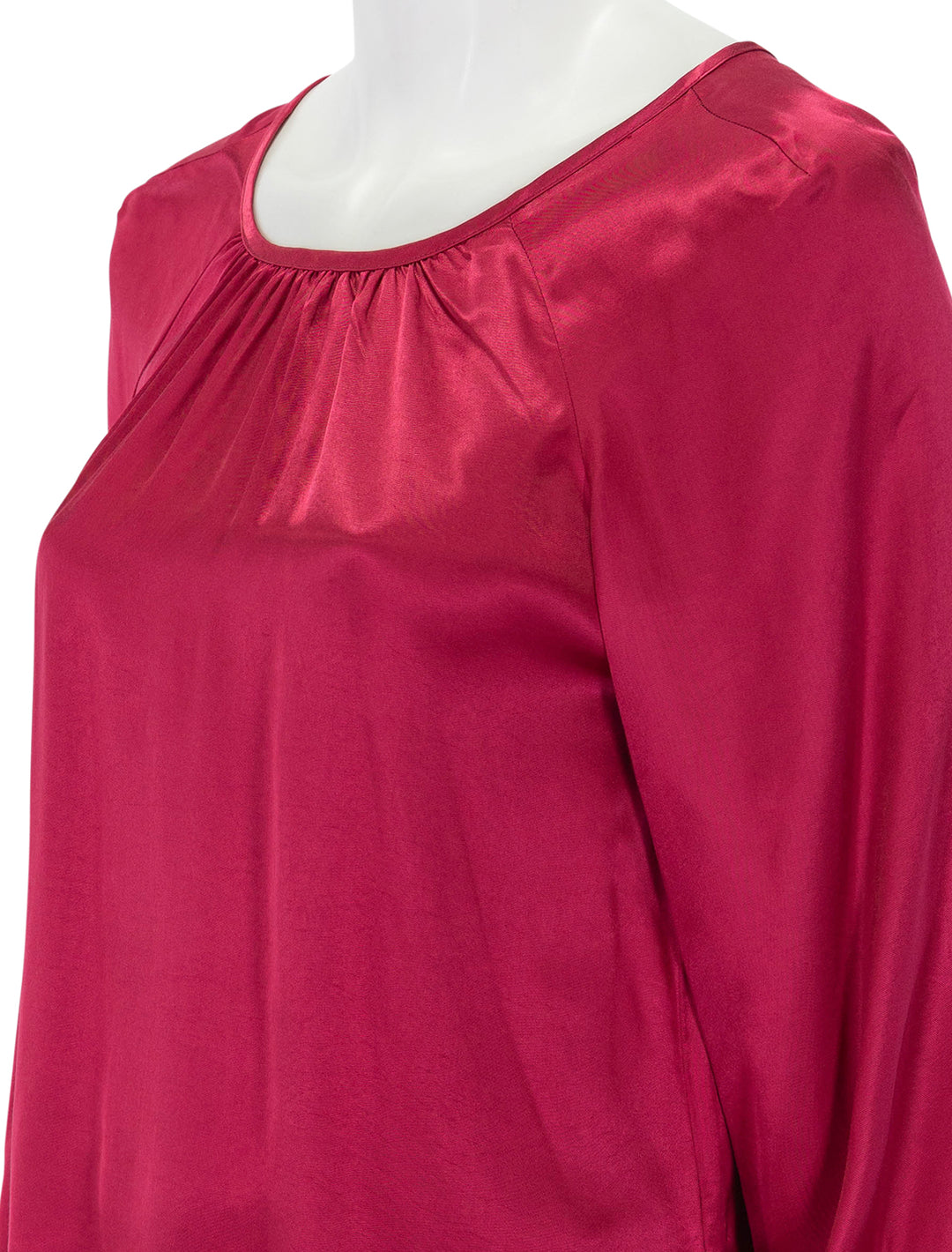 Close-up view of Nation LTD's eveline raglan top in raspberry jam.