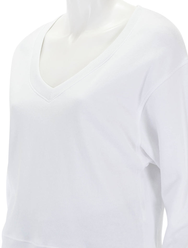 Close-up view of Nation LTD's wyatt oversized vneck in white.