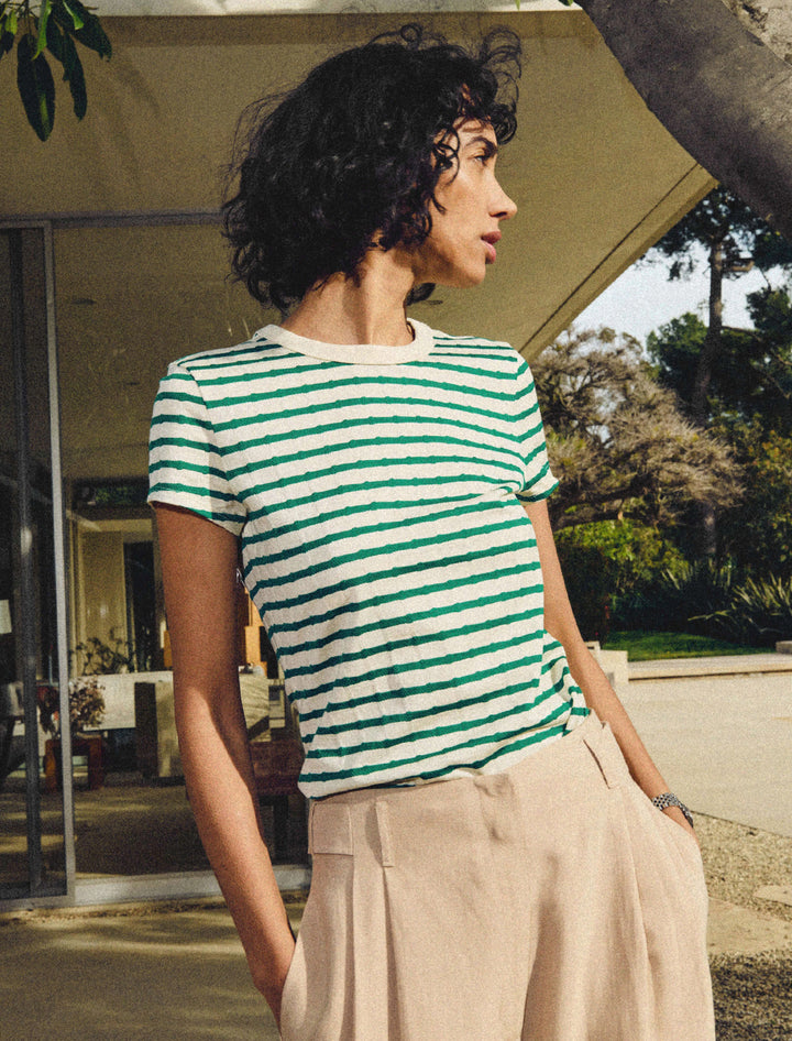 Model wearing Nation LTD's laurence shrunken tee in verdant stripe.