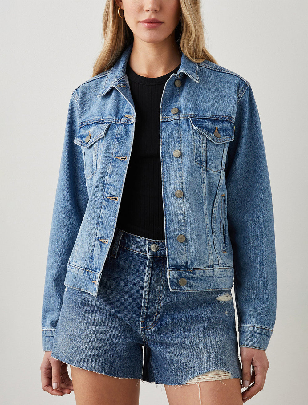 Model wearing Rails' the mulholland denim jacket in original blue.