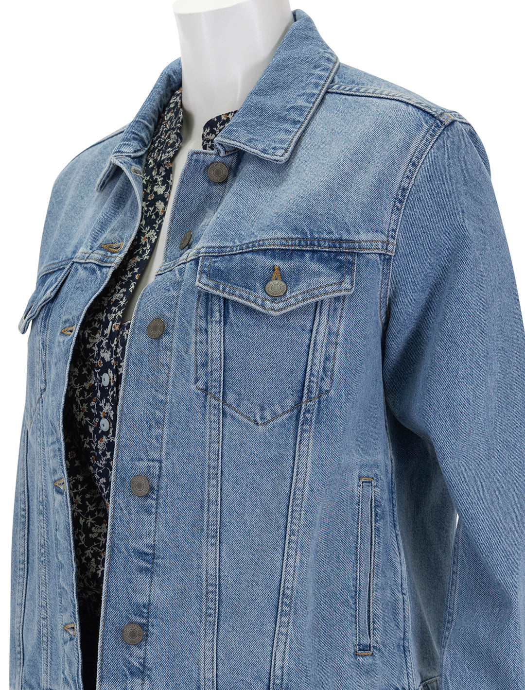 Close-up view of Rails' the mulholland denim jacket in original blue.