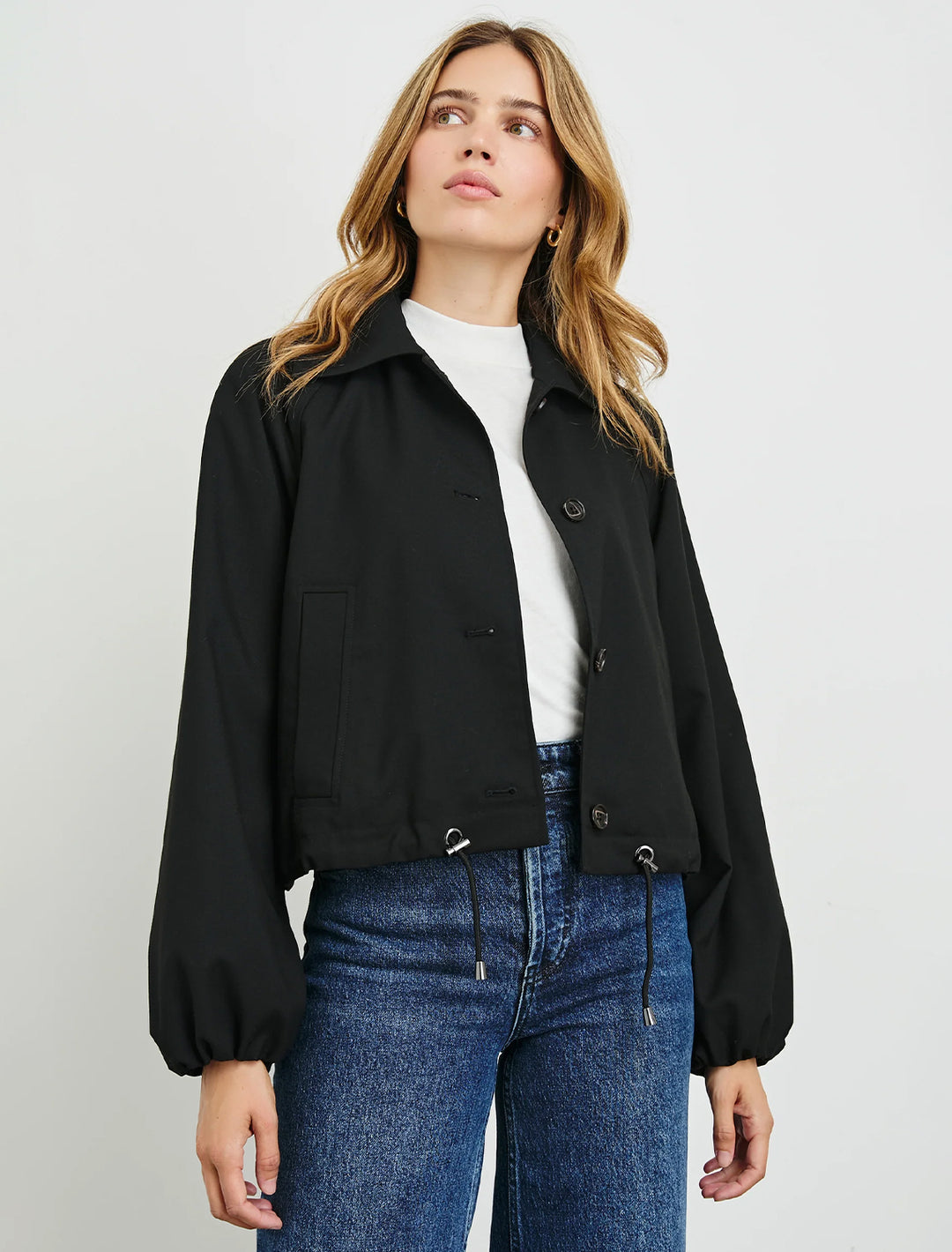 Model wearing Rails' north jacket in black.