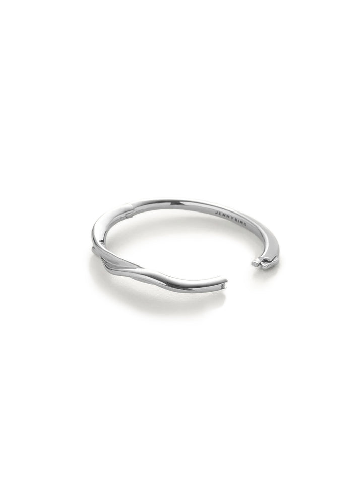 Open view of Jenny Bird's colette bangle in silver.