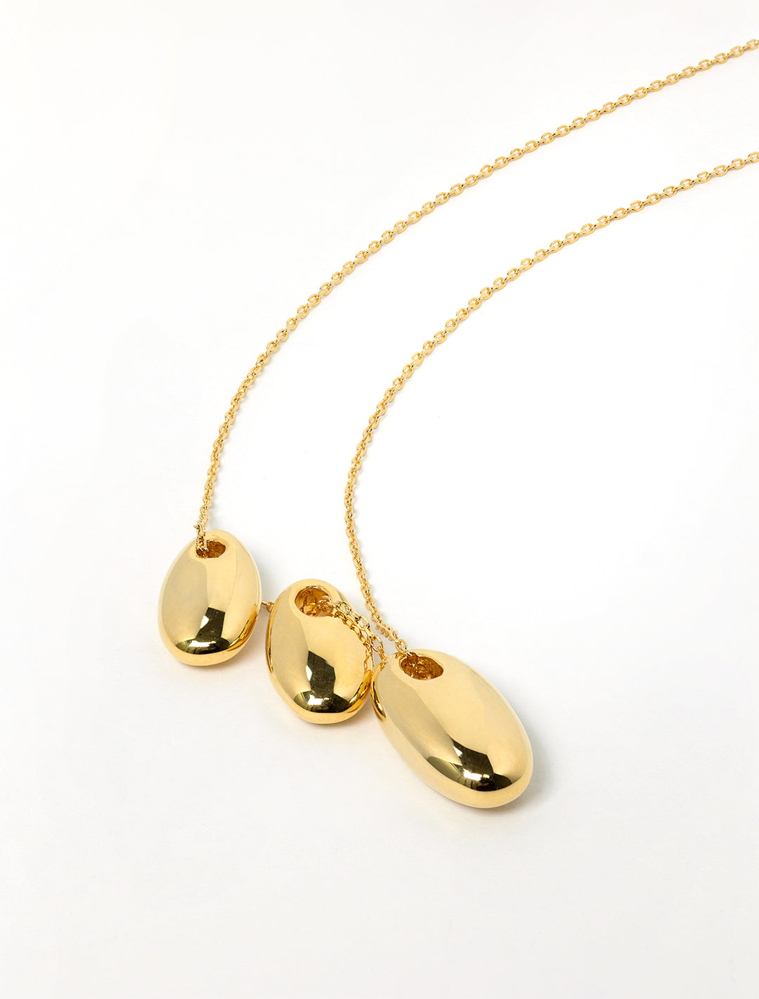 triple puffy oval necklace in gold