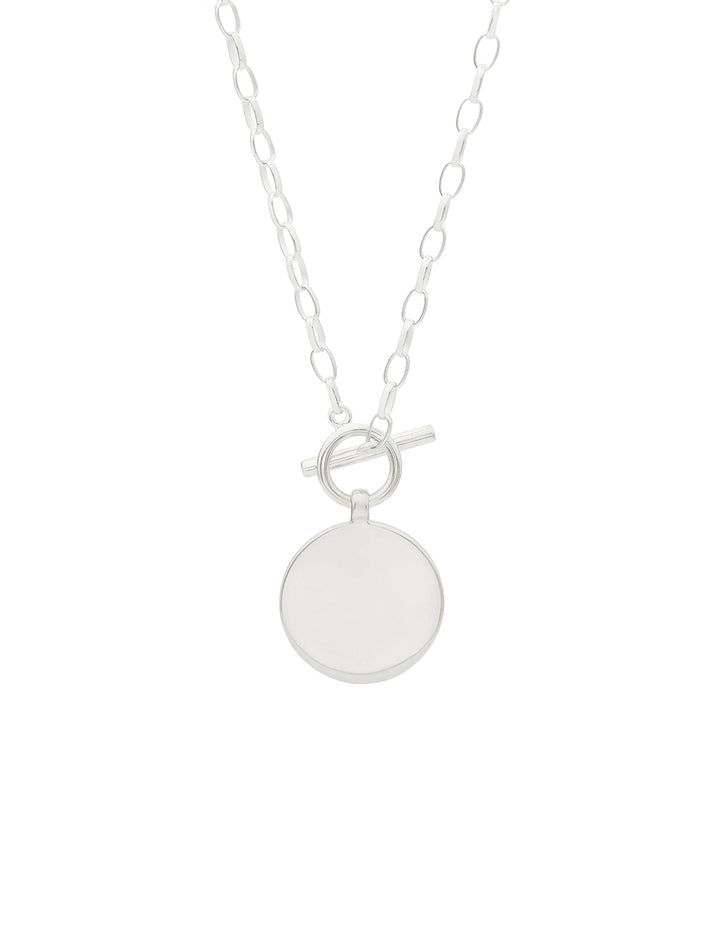 Back view of Anna Beck's classic dotted circle toggle necklace.