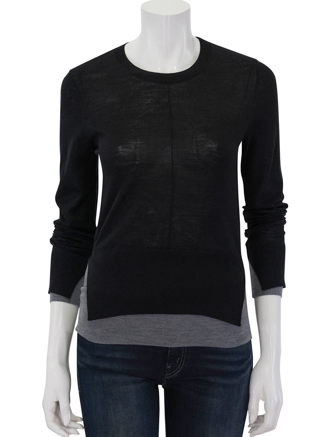 Front view of Saint Art's myra layered sweater in black and grey.