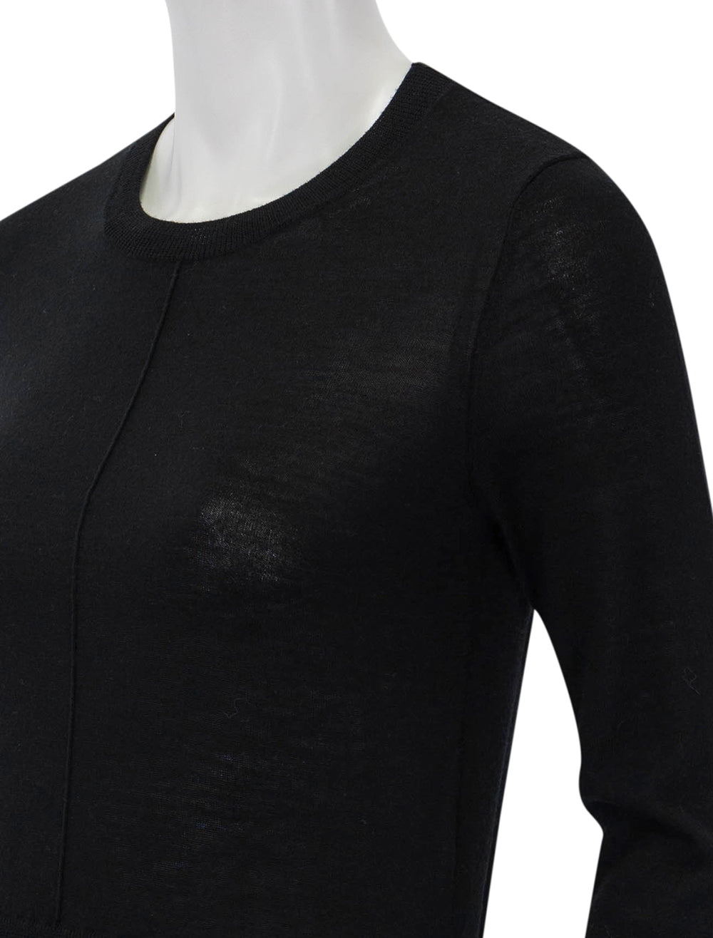 Close-up view of Saint Art's myra layered sweater in black and grey.