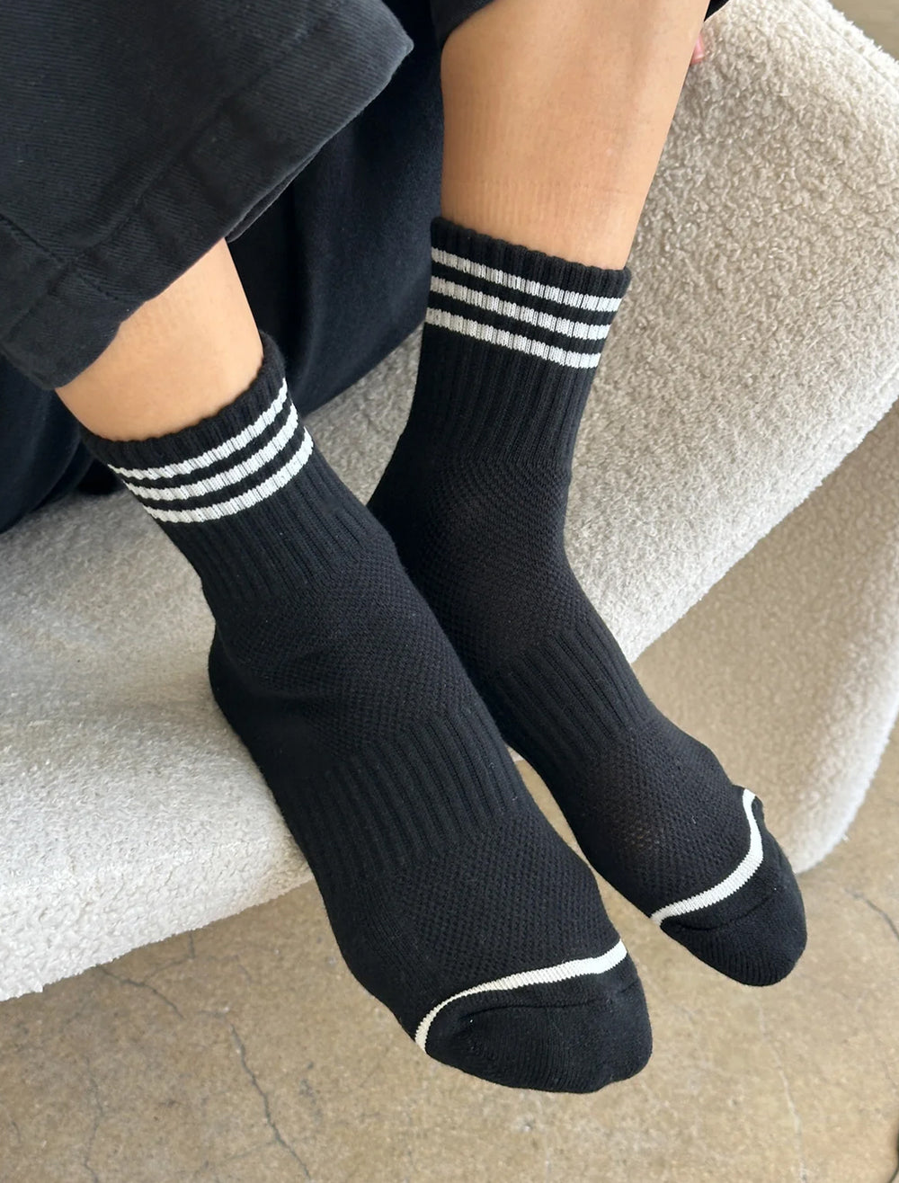 Model wearing Le Bon Shoppe's girlfriend socks in black.