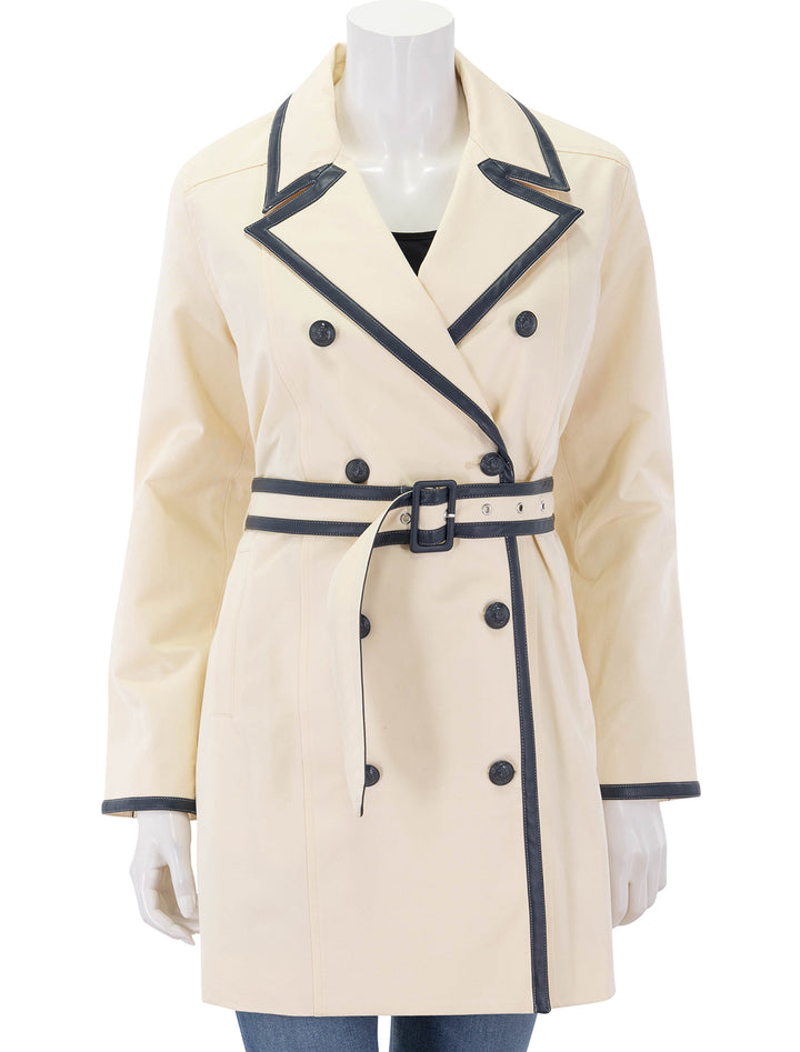 toru leather trim trench in light pearl and midnight