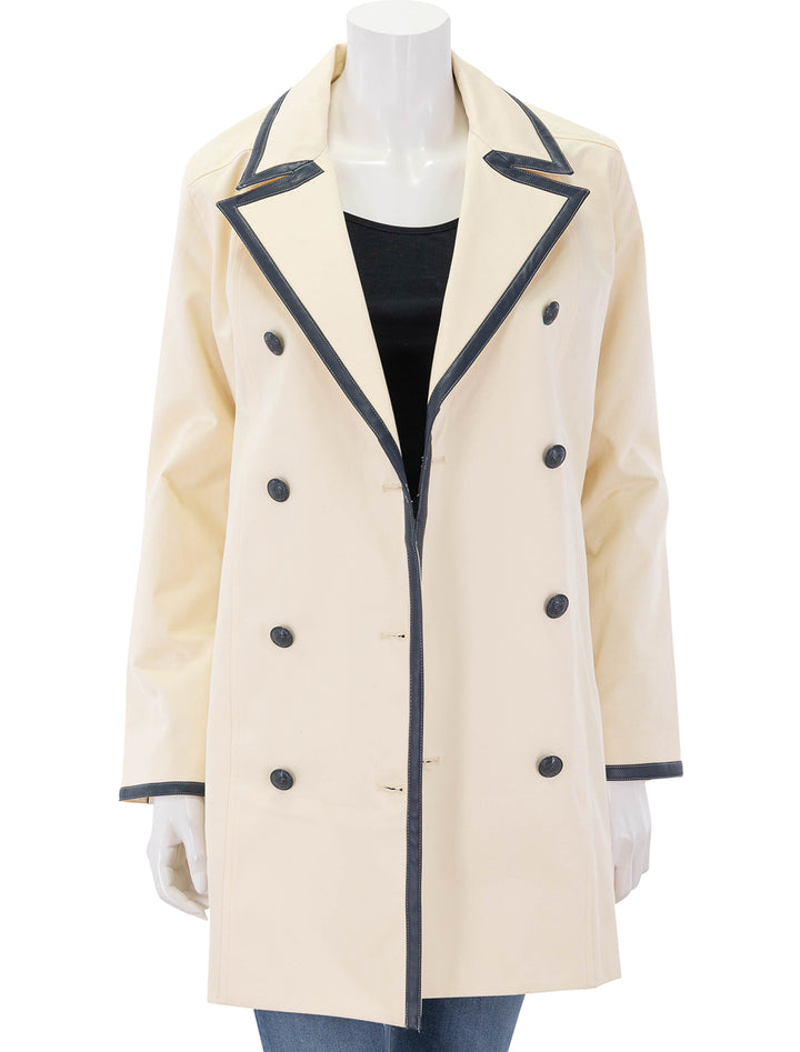 toru leather trim trench in light pearl and midnight