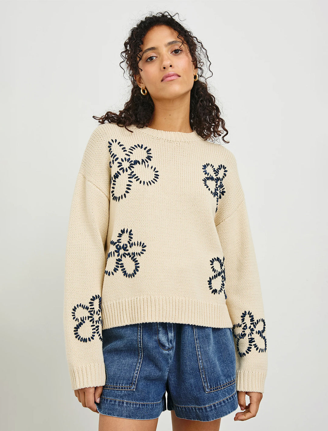 zoey sweater with stitched daisies