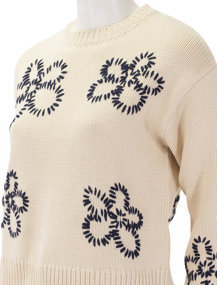 zoey sweater with stitched daisies