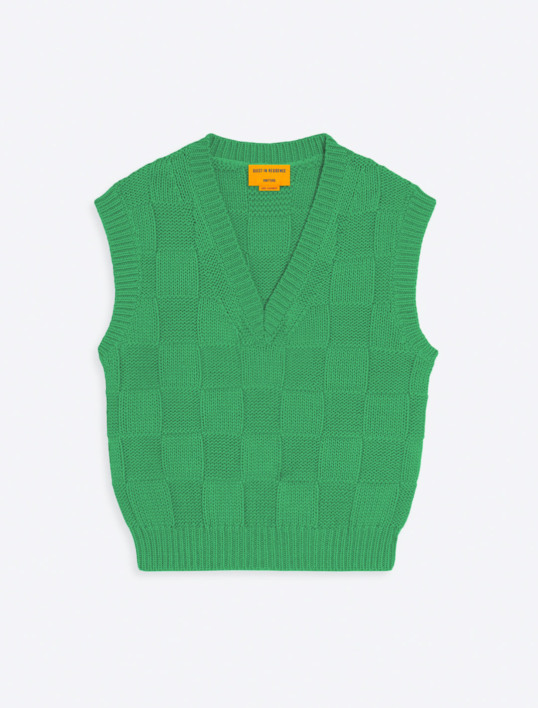 checker vest in rainforest