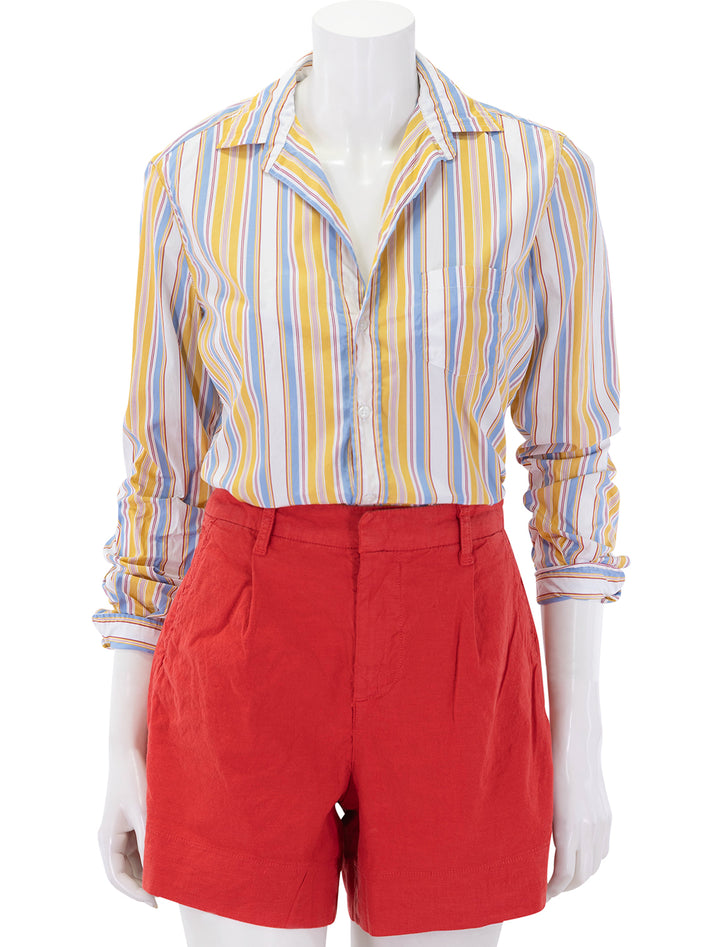 eileen in gold, red and blue stripe