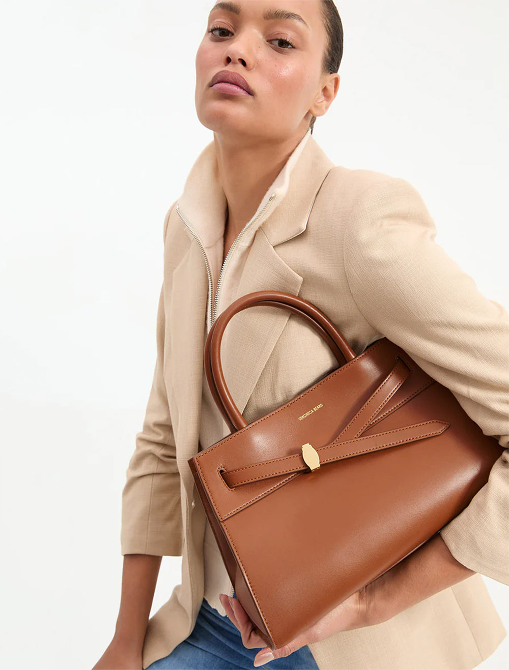 model holding dash bag in hazelwood