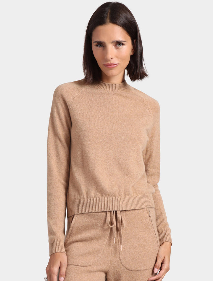 model wearing cashmere shrunken crew neck sweater in camel