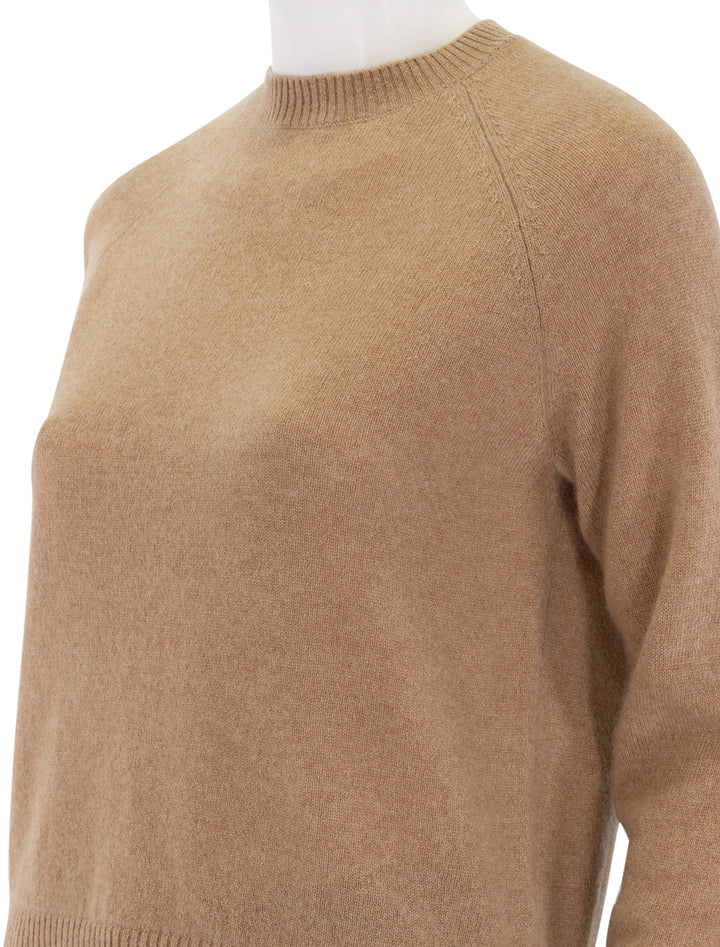 close up view of cashmere shrunken crew neck sweater in camel