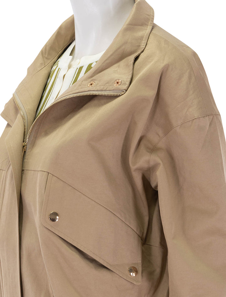 close up view of eplo jacket in camel