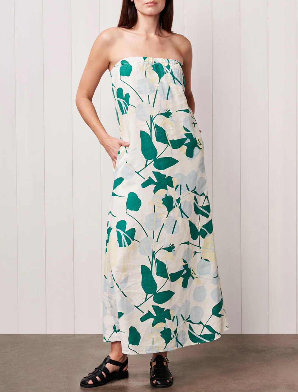 model wearing blossom printed linen column maxi dress