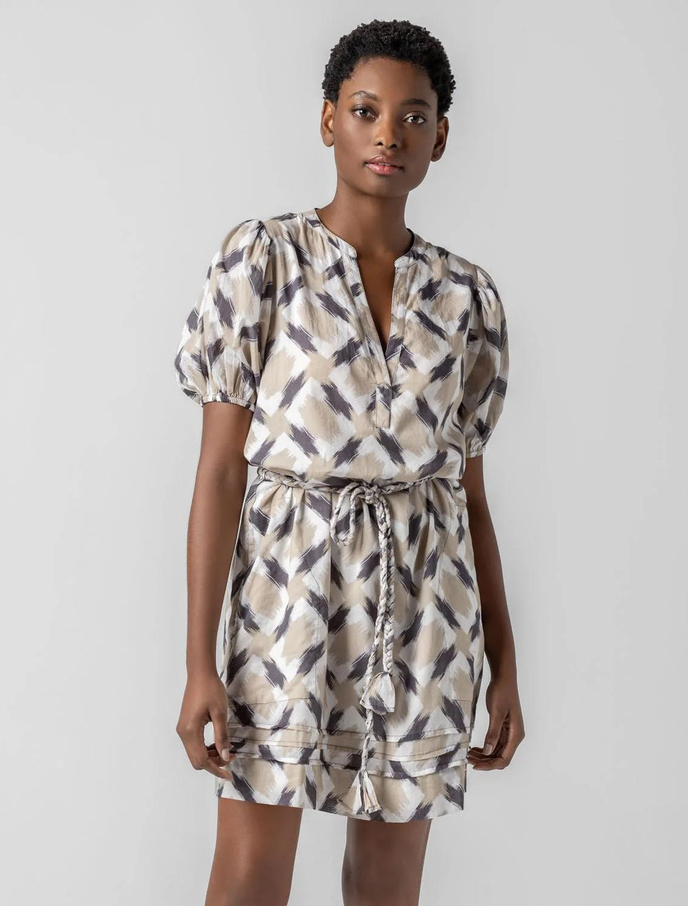 model wearing neutral ikat print dress