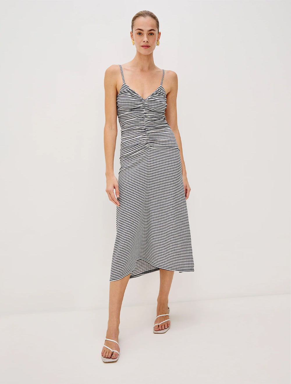 model wearing mari dress in navy gingham