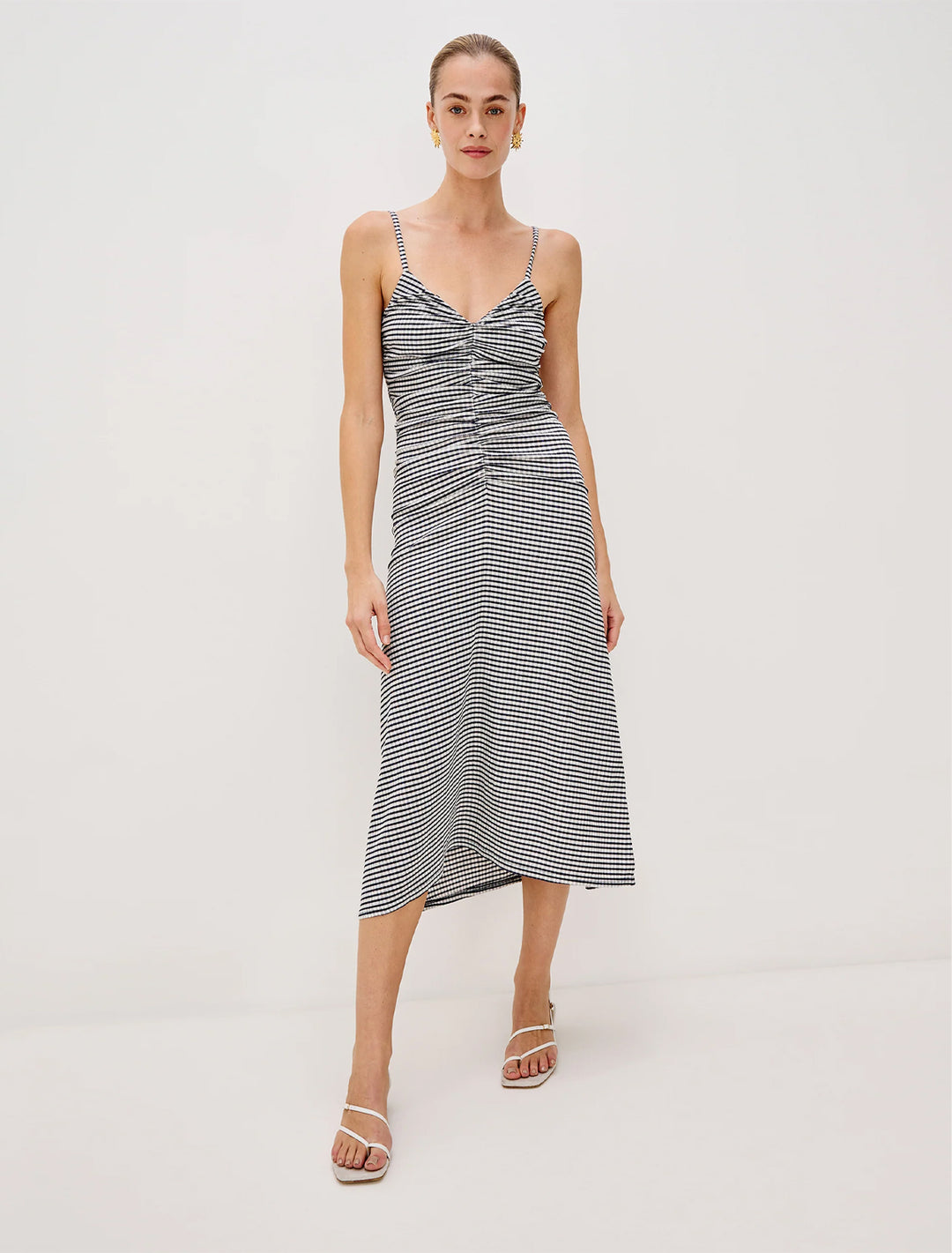 model wearing mari dress in navy gingham