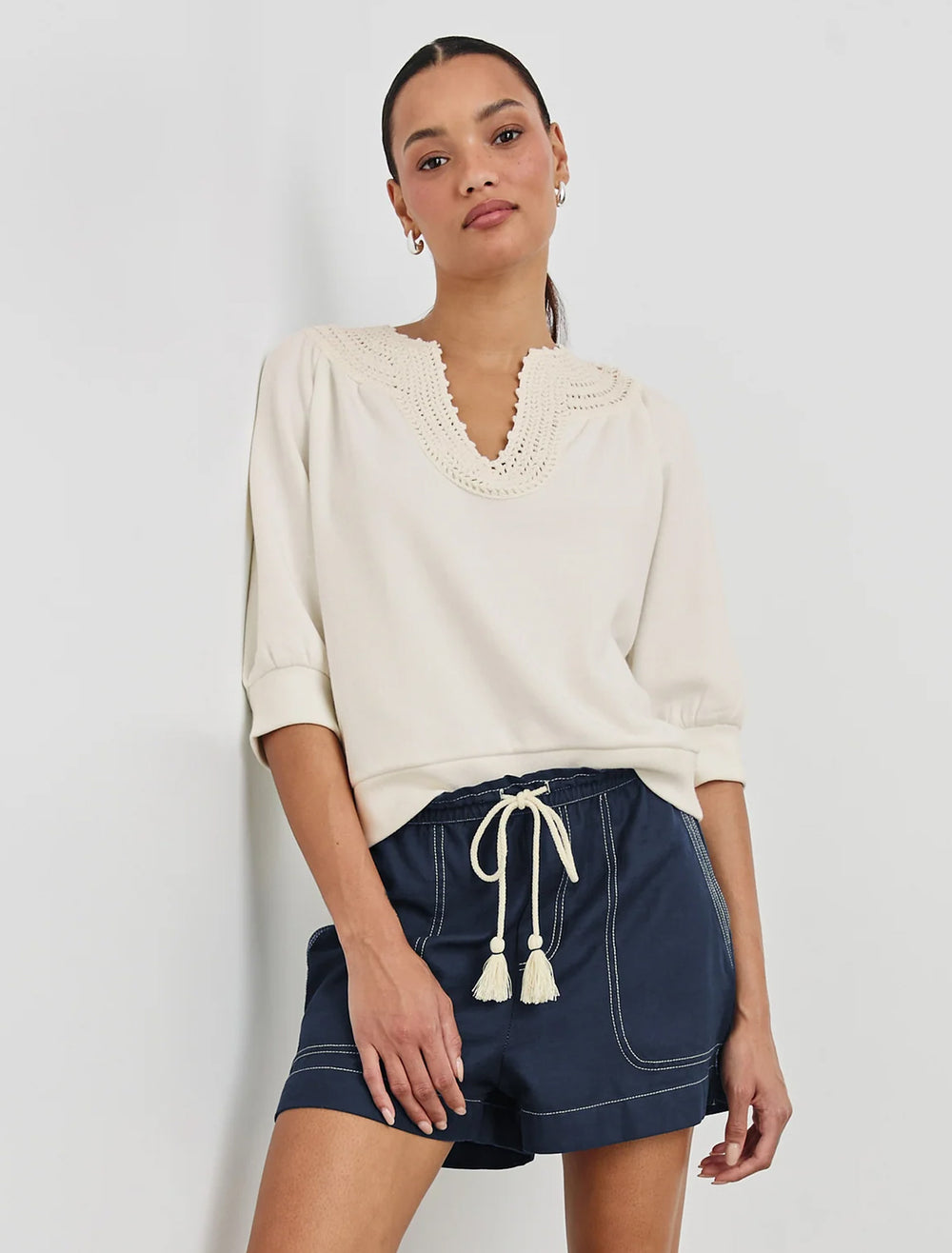 model wearing mariposa top in ivory