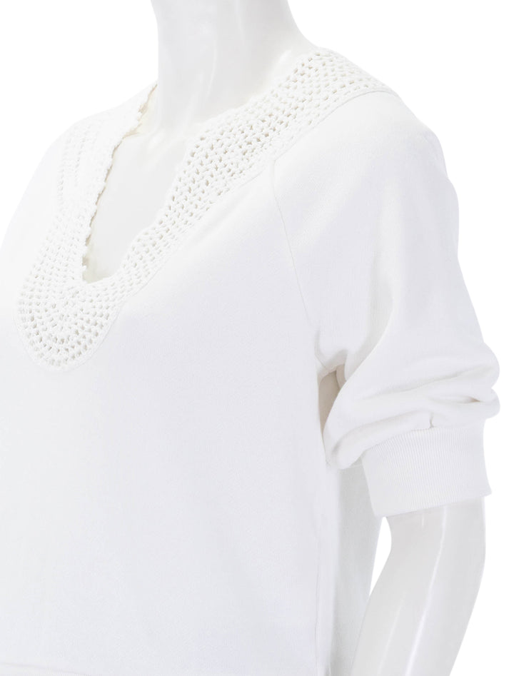 close up view of mariposa top in ivory