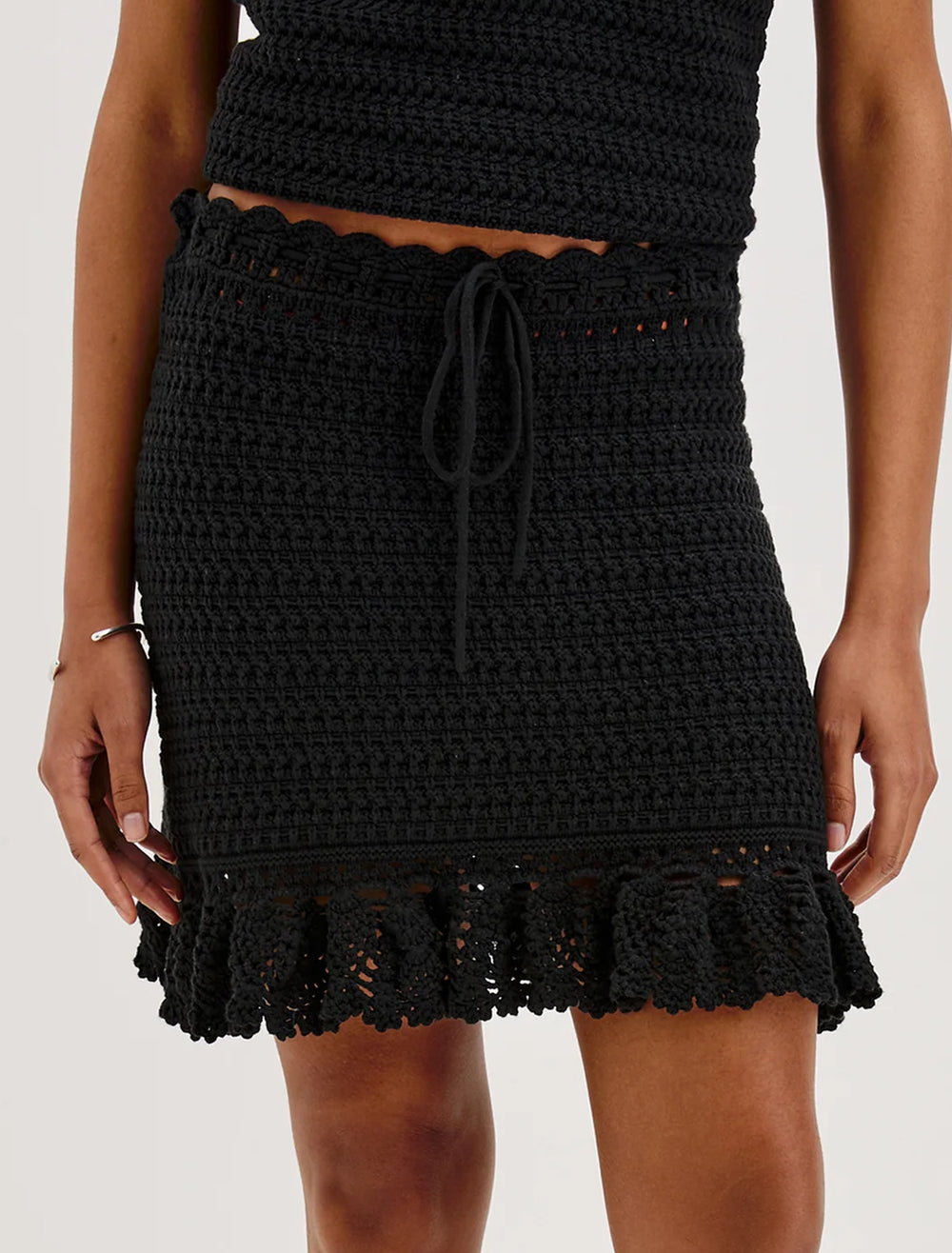 model wearing kaylie knit skirt in black