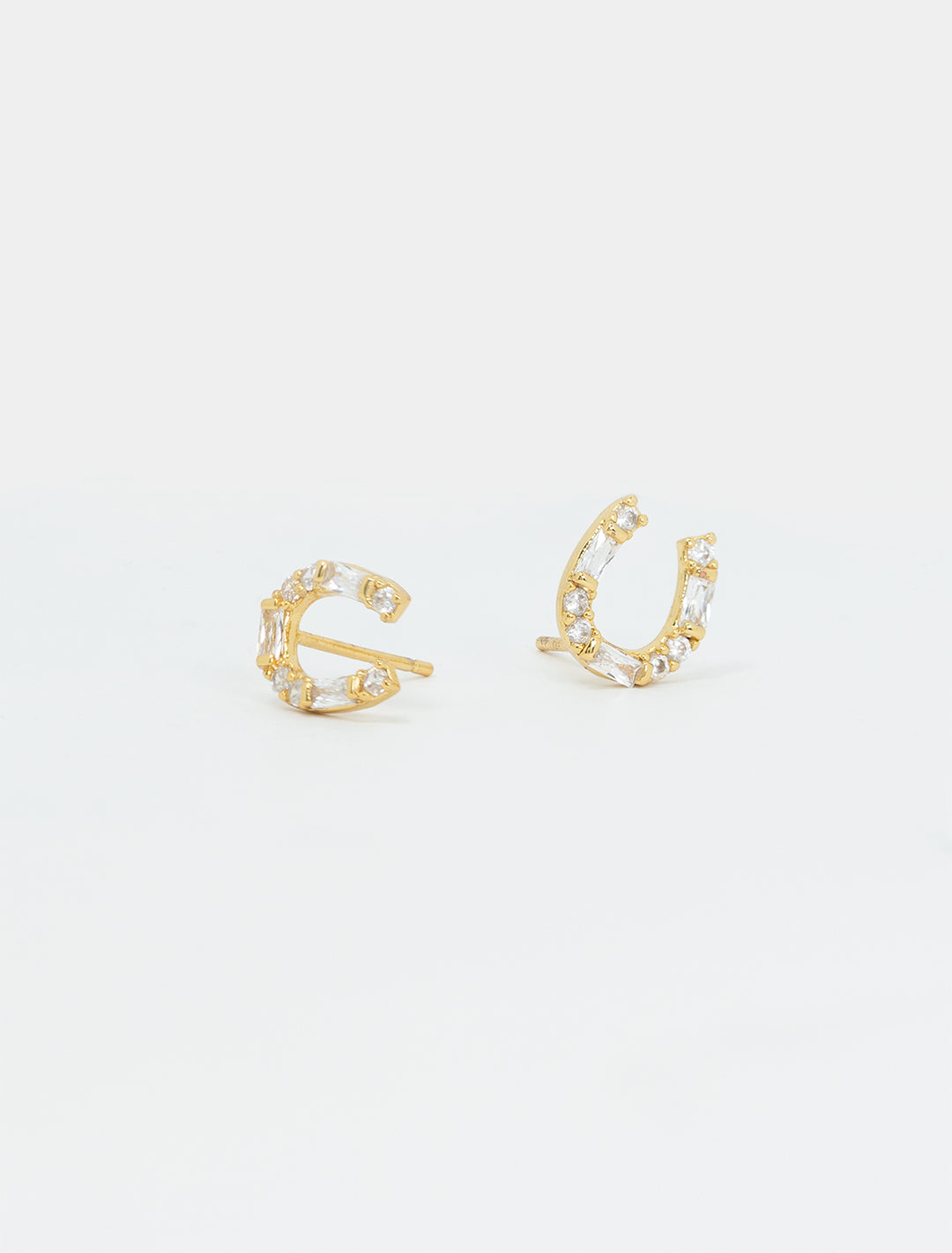 horseshoe studs in gold with cz