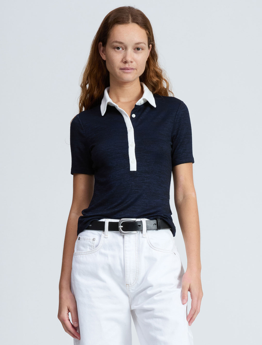 the knit button down short sleeve polo in navy