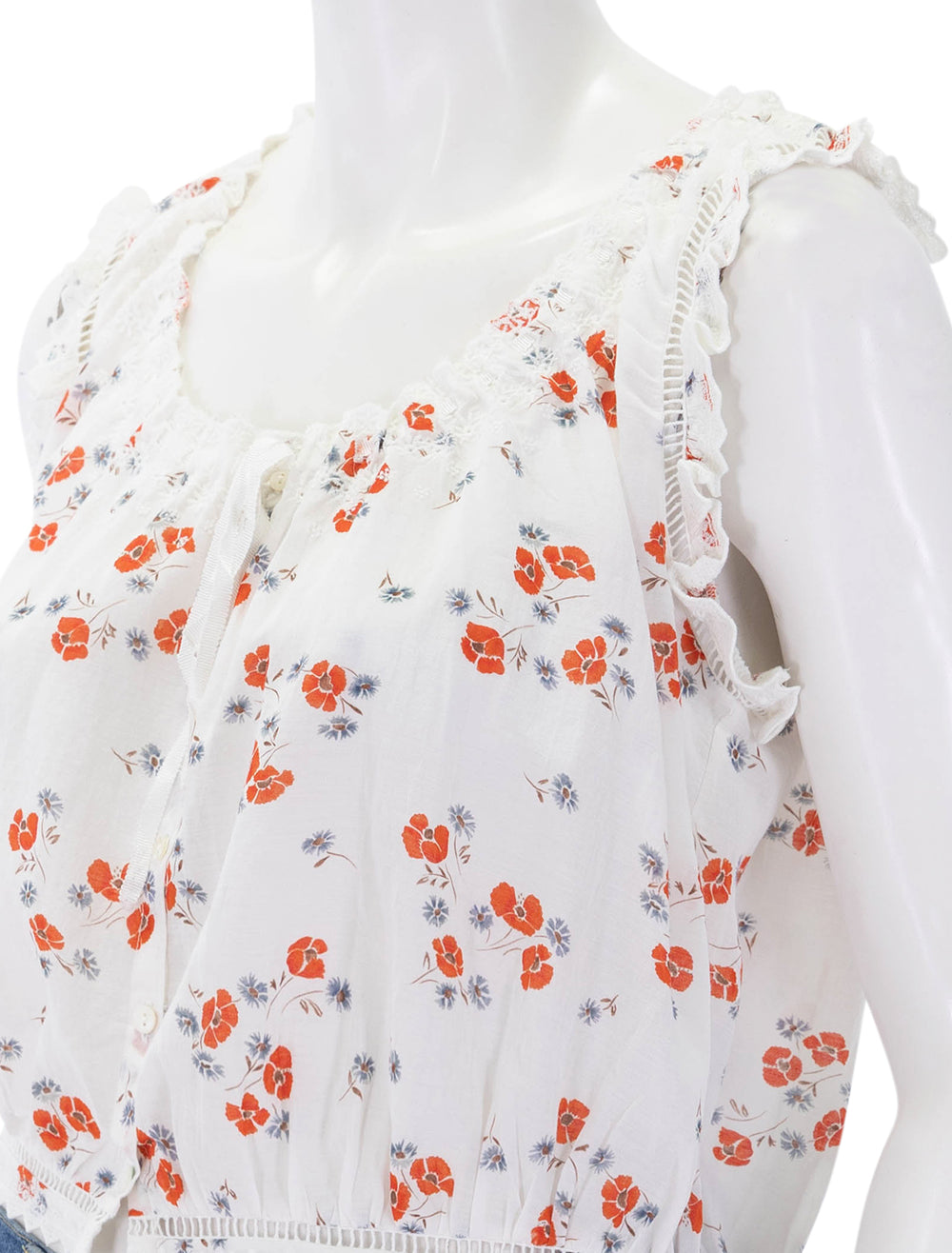 close up view of traveler top in poppy field