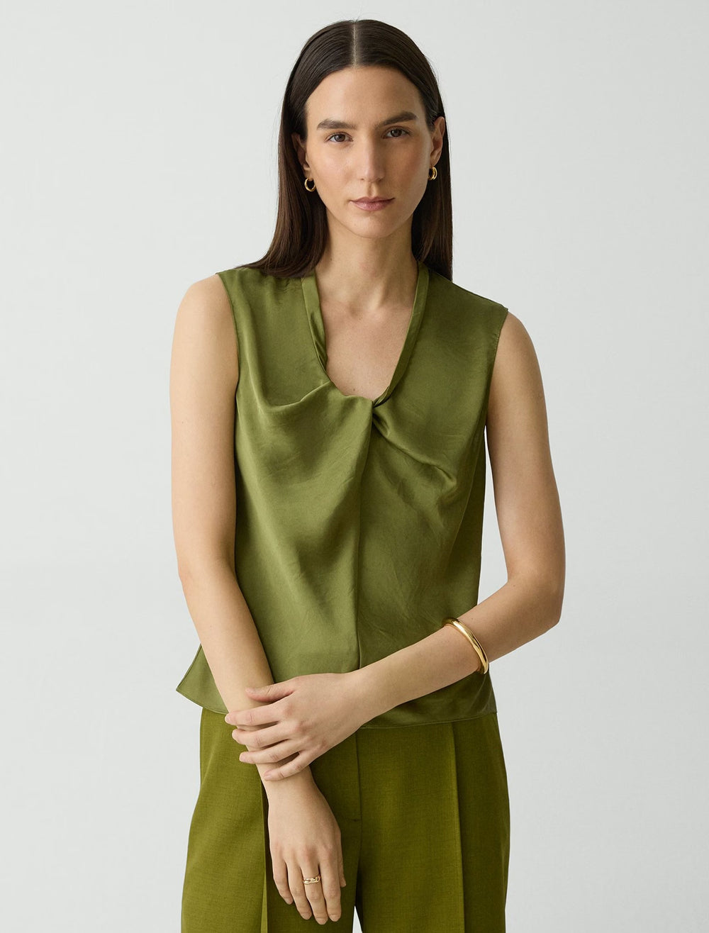 model wearing twist scoop top in avocado
