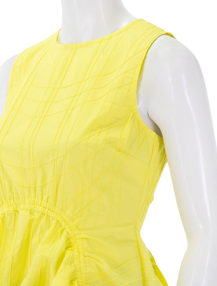 close up view of camden tank in yellow