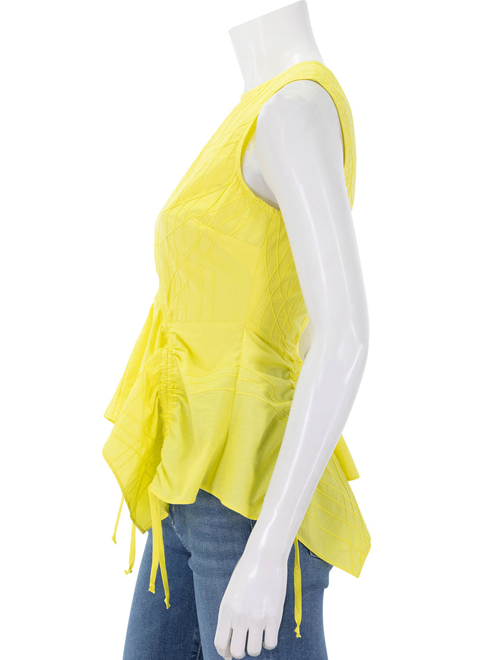 side view of camden tank in yellow