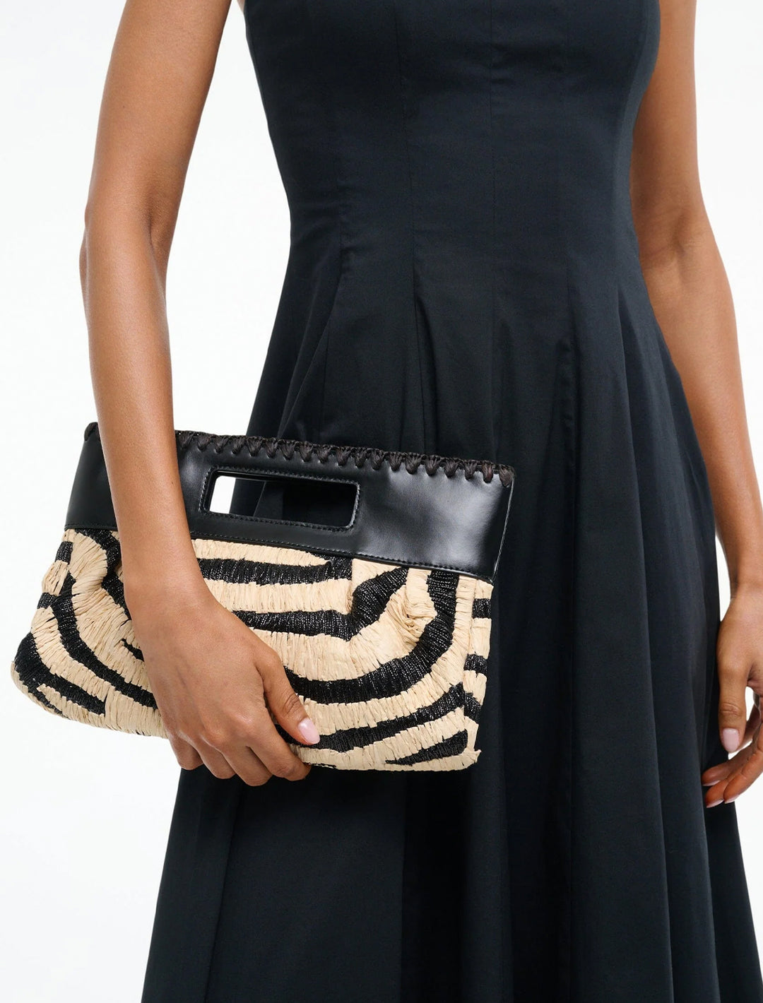 lena clutch in zebra raffia