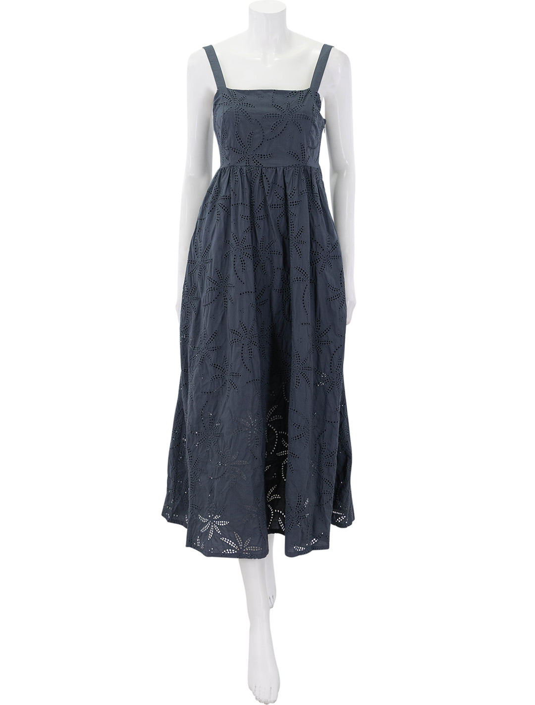 front view of rosette eyelet dress in indigo