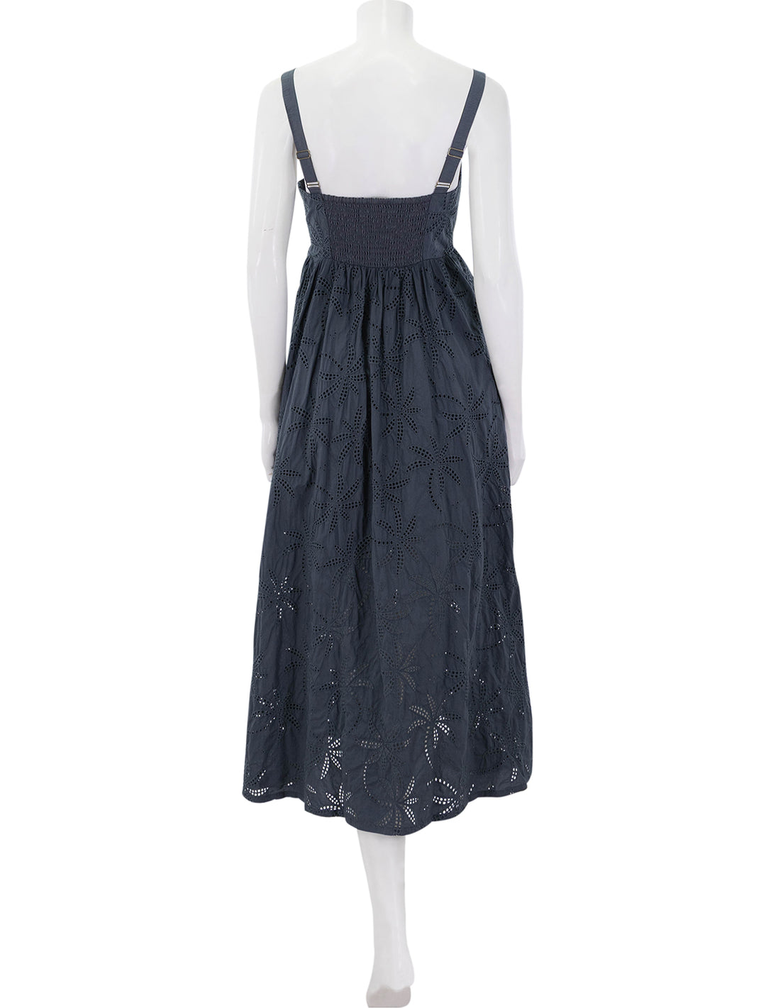 back view of rosette eyelet dress in indigo