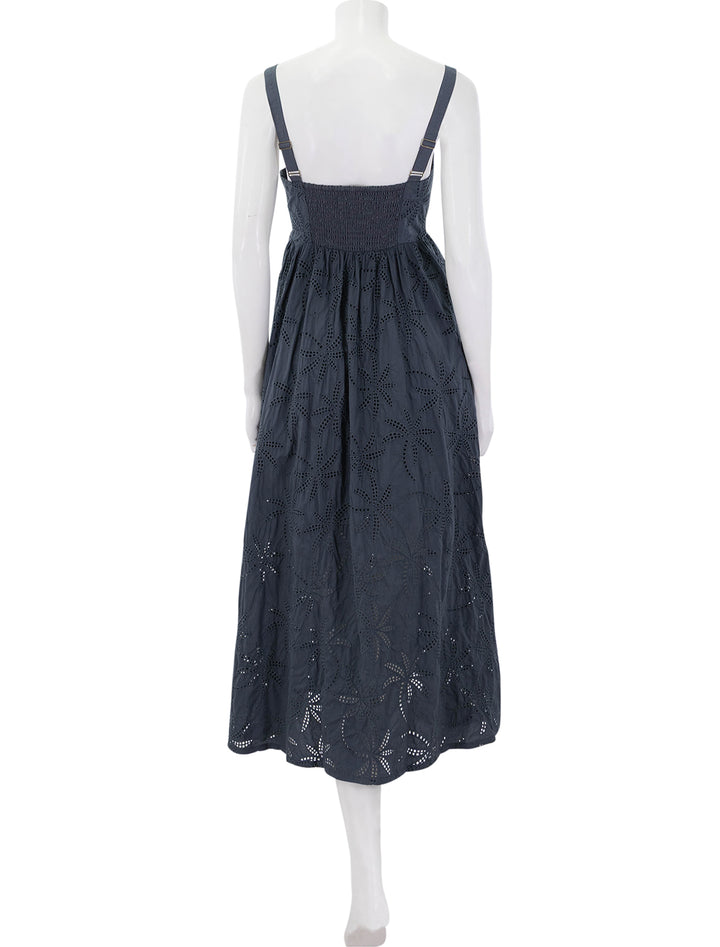 back view of rosette eyelet dress in indigo