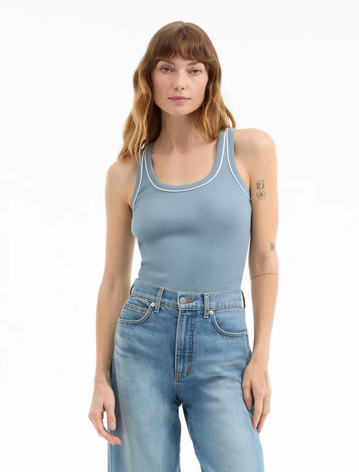 model wearing birke tank with contrast piping in lake mist