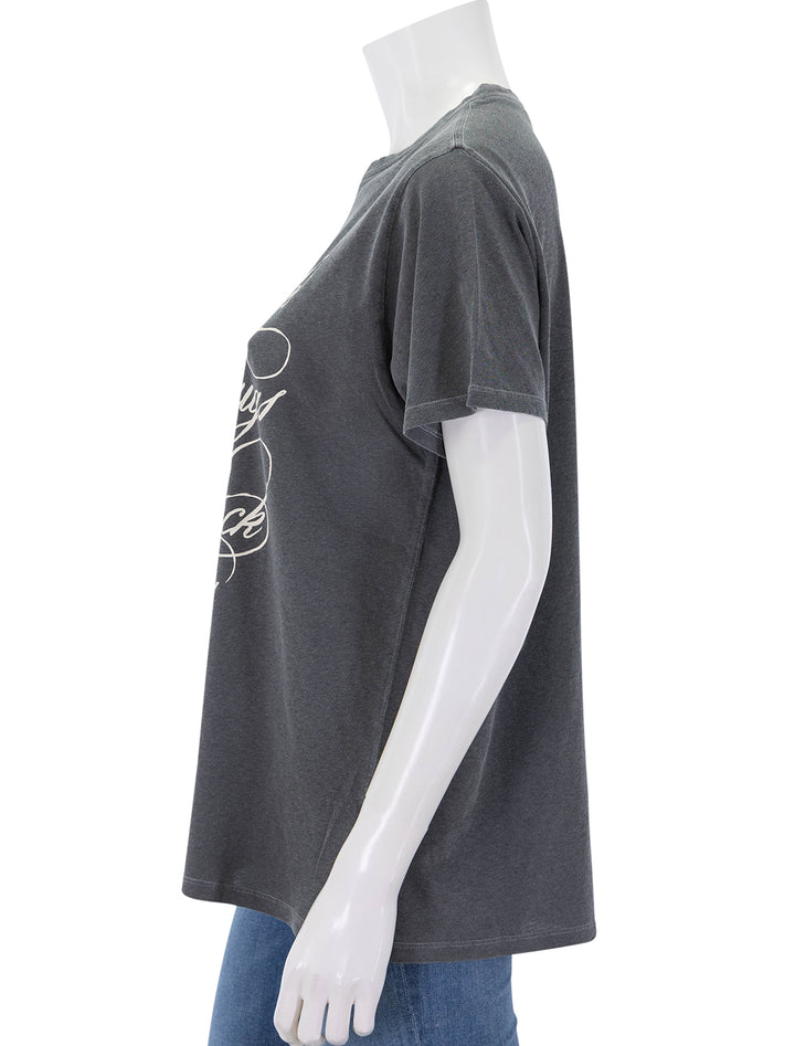 side view of original tee in faded black & cream
