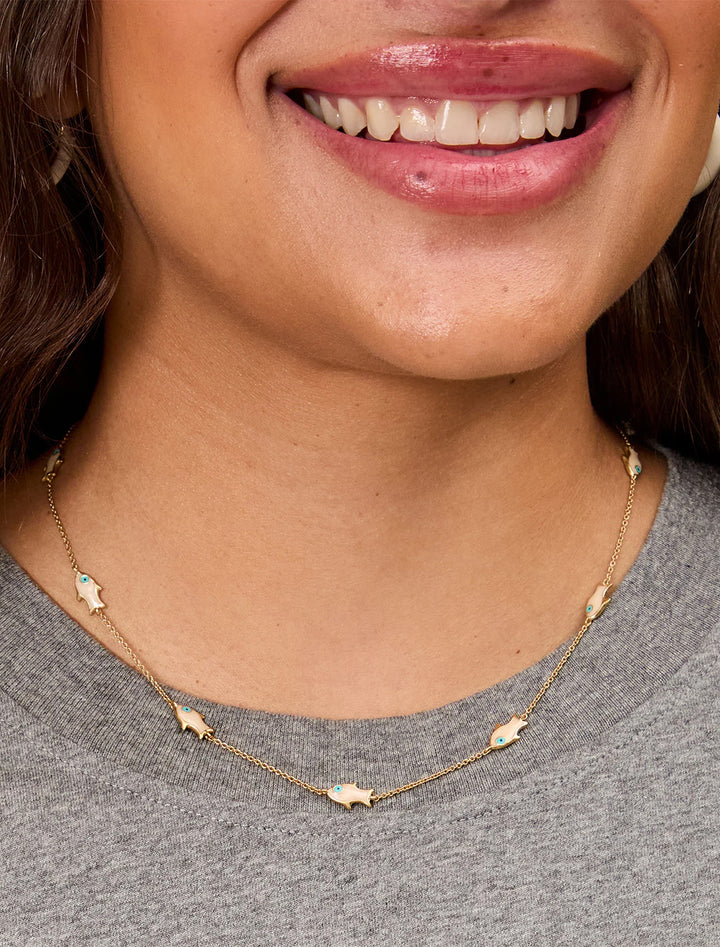 model wearing petite pearl sardine charm chain necklace