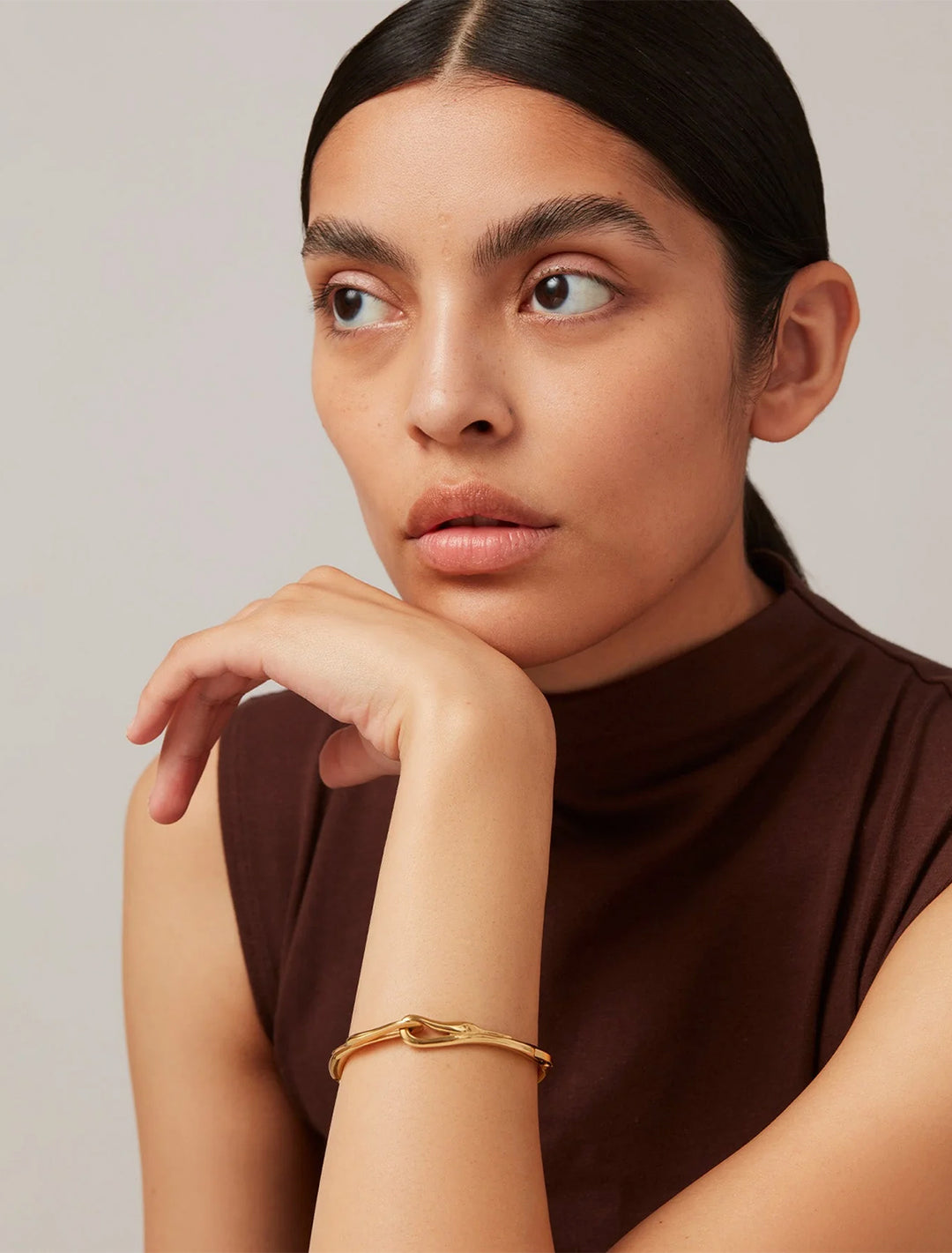 model wearing lisieux bangle in gold