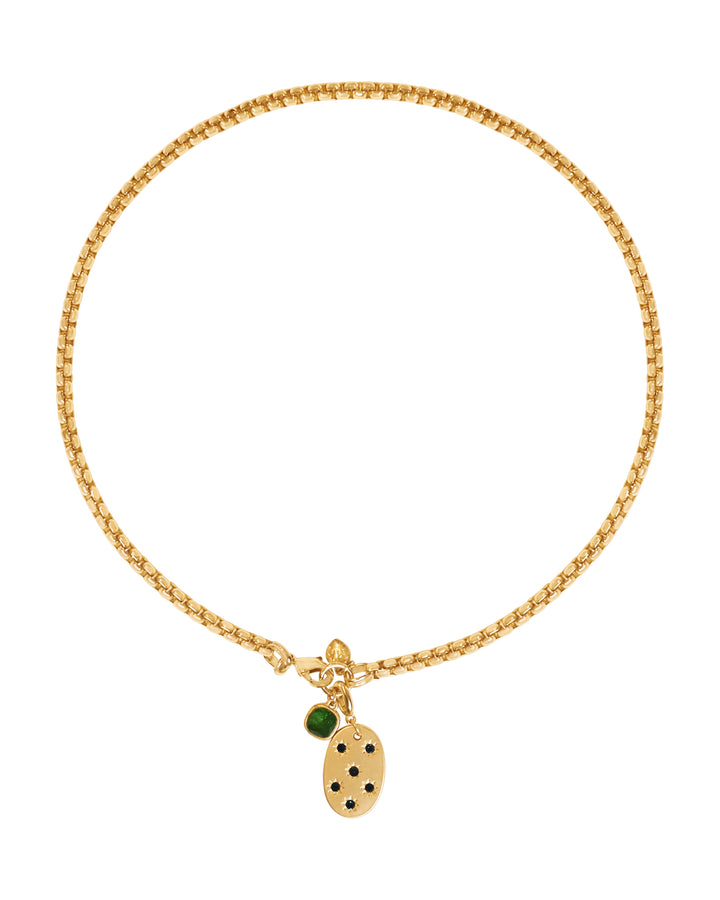 the token necklace in gold