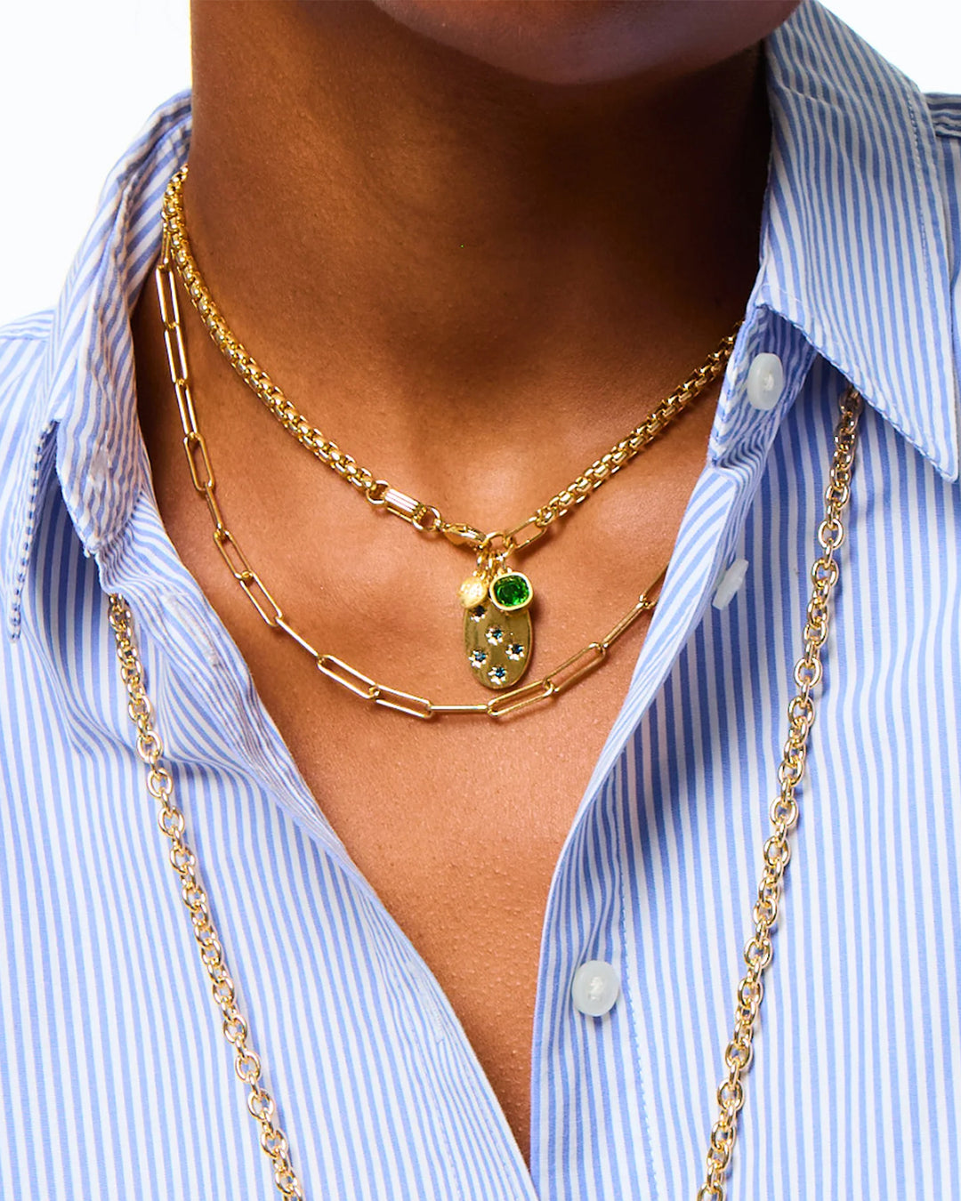 the token necklace in gold