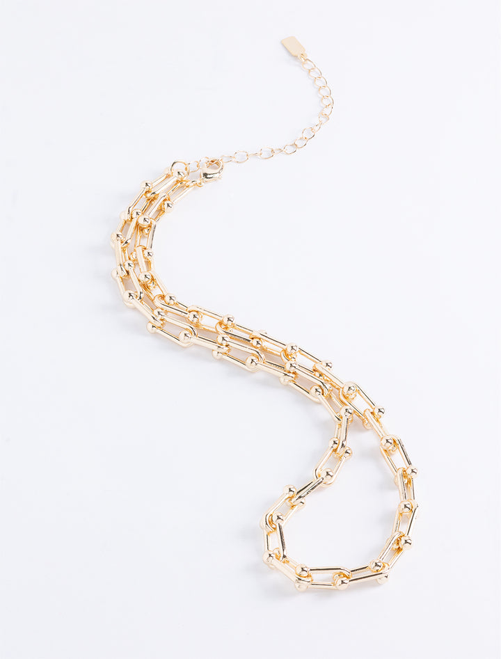 equestrian u chain necklace in gold