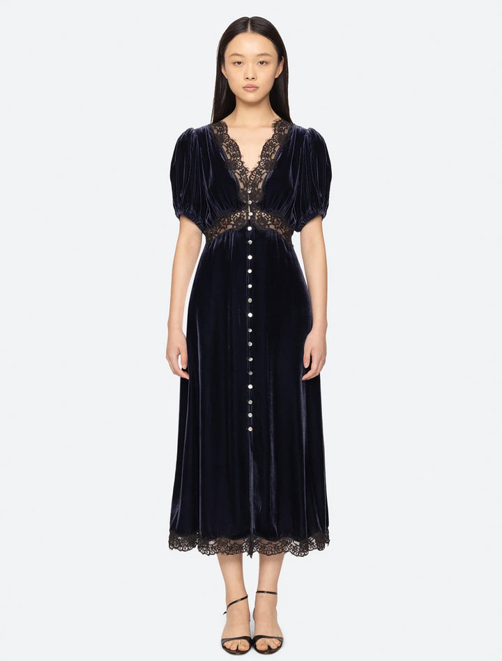 clarice velvet puff sleeve midi dress in navy